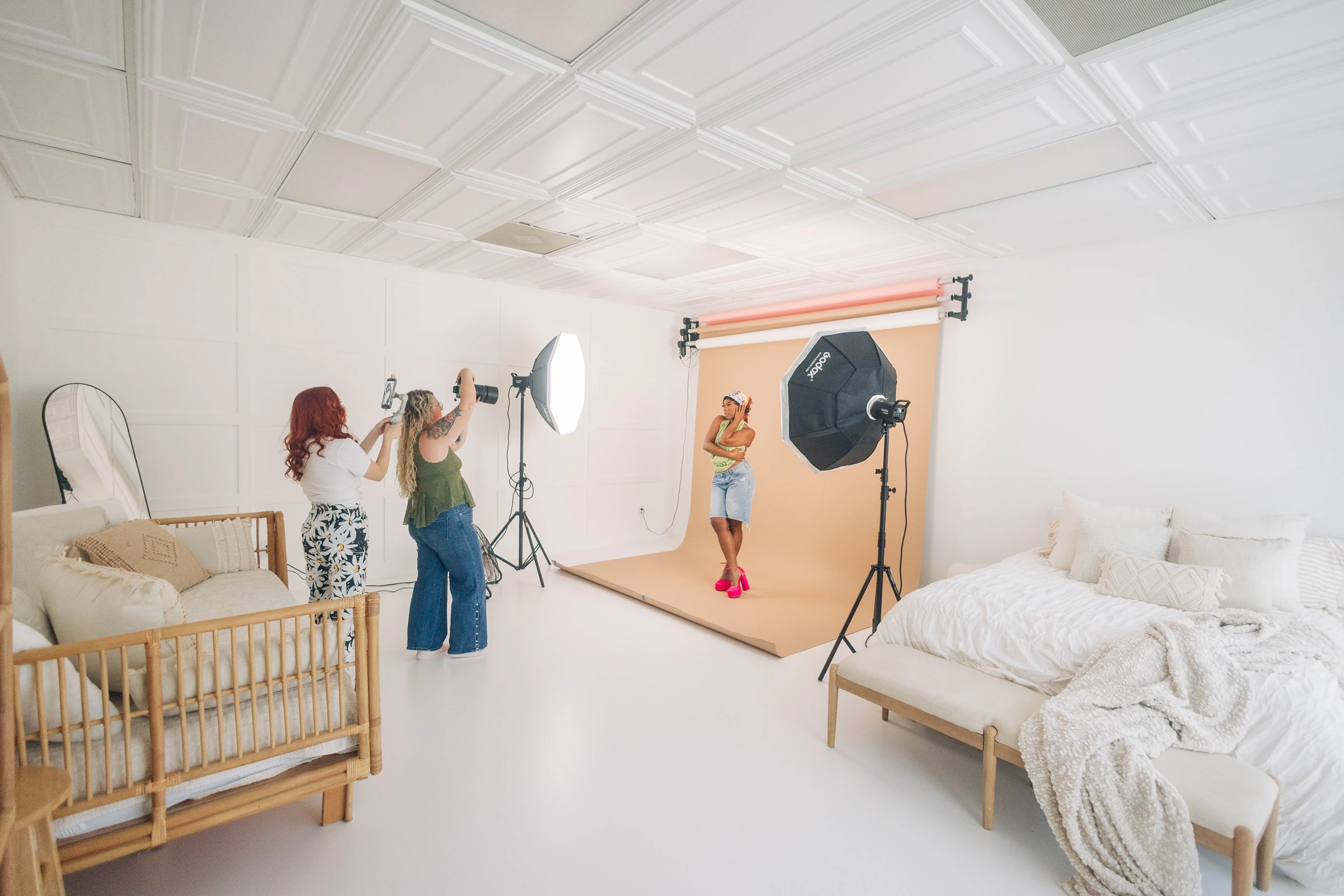 A shoot in progress at SMP Creative Studio, softbox lighting over the seamless backdrop