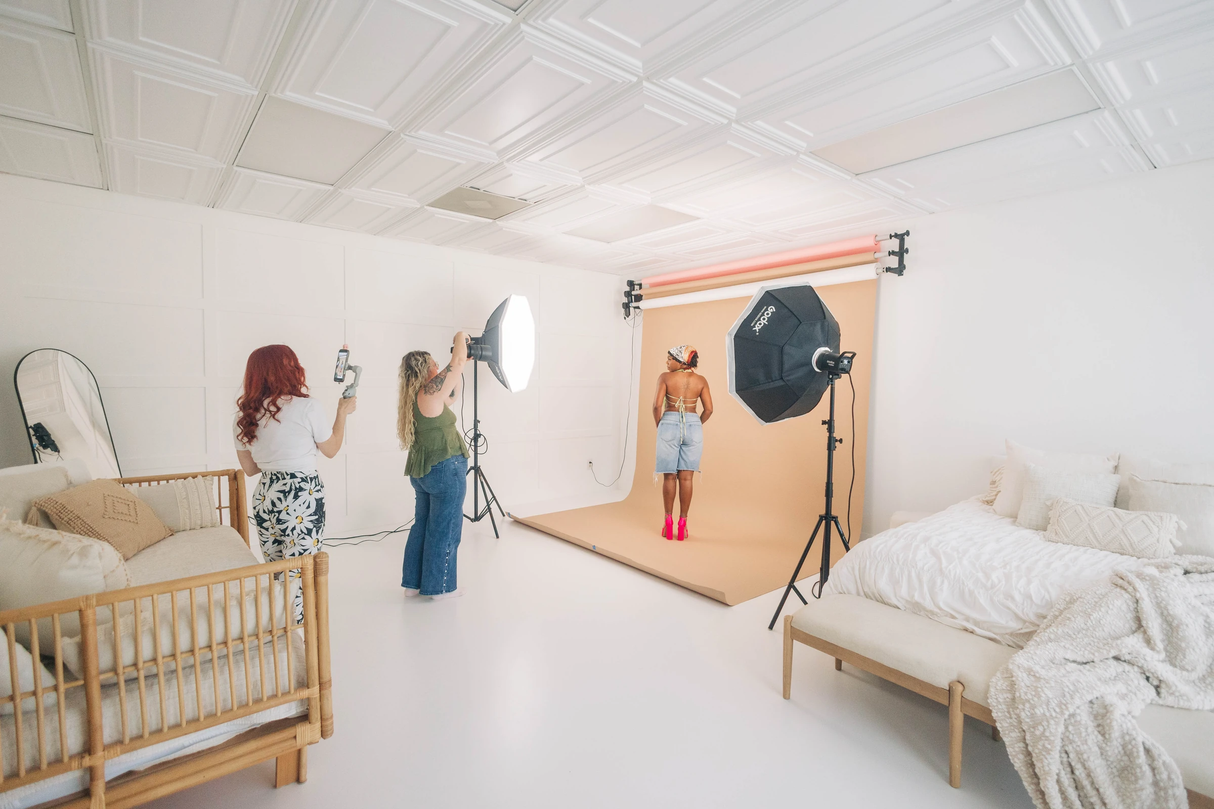 A photographer and client mid-session at SMP Creative Studio