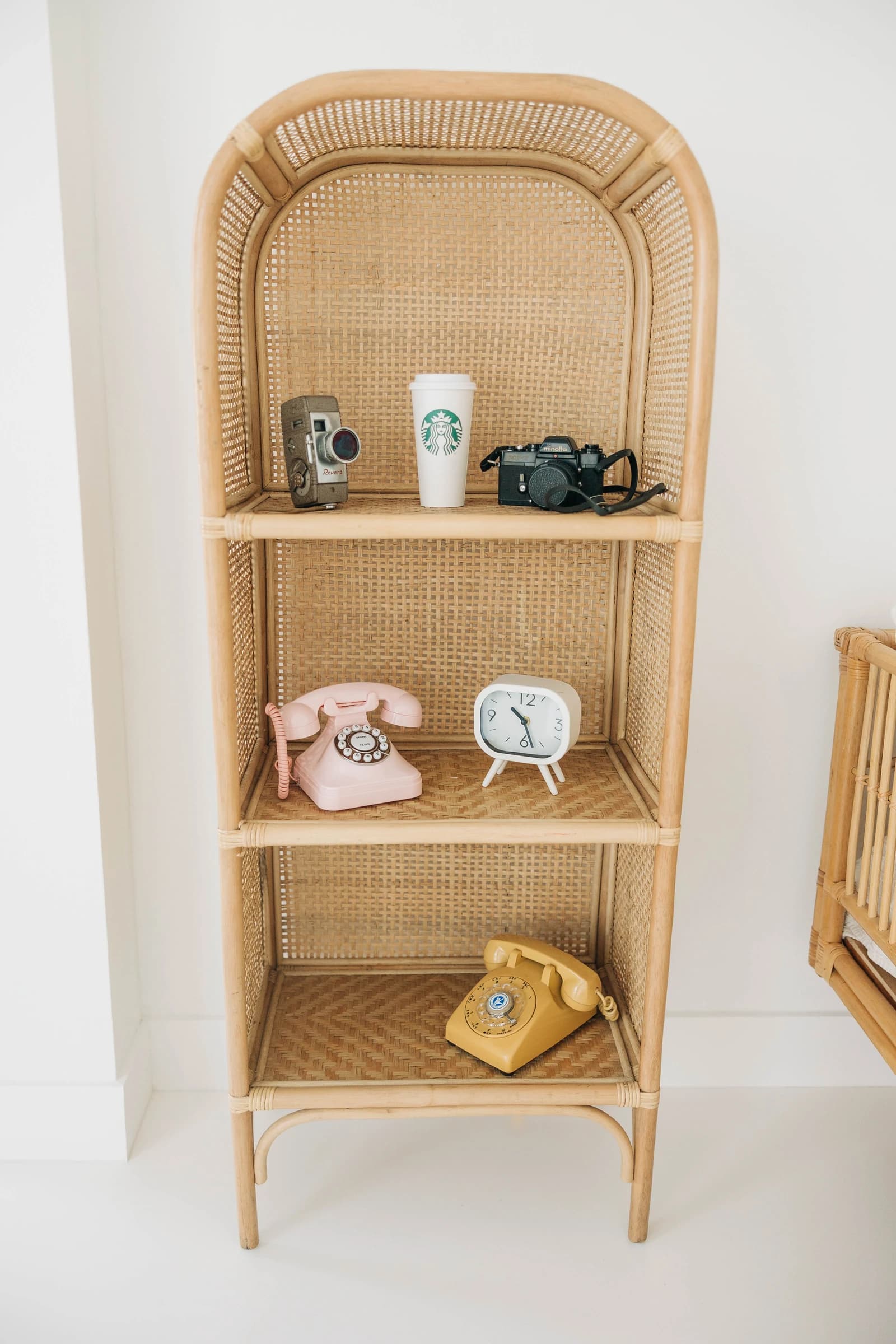 Studio A's prop shelf, styled with cameras and retro pieces