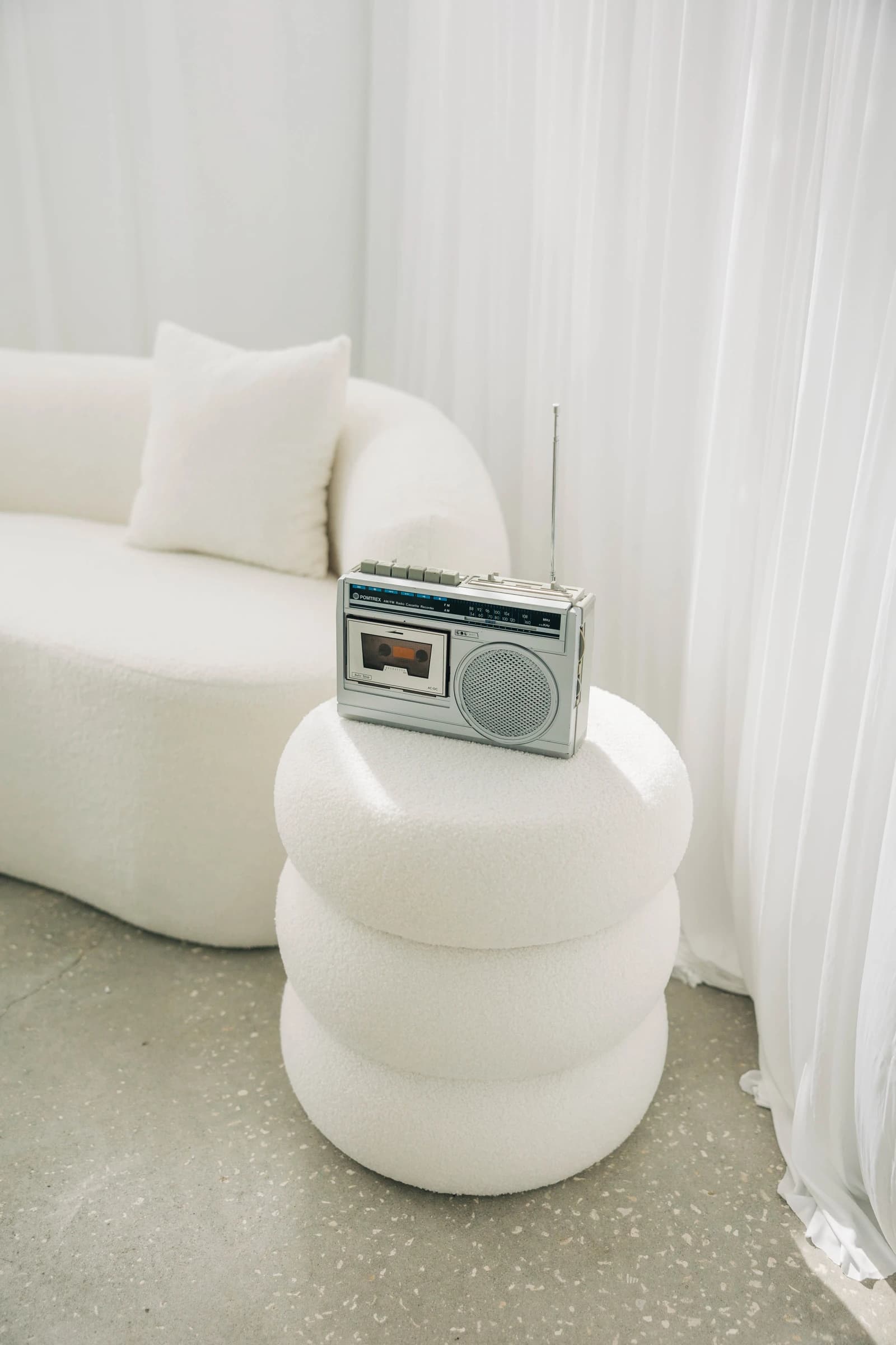 Studio B's curved white sofa
