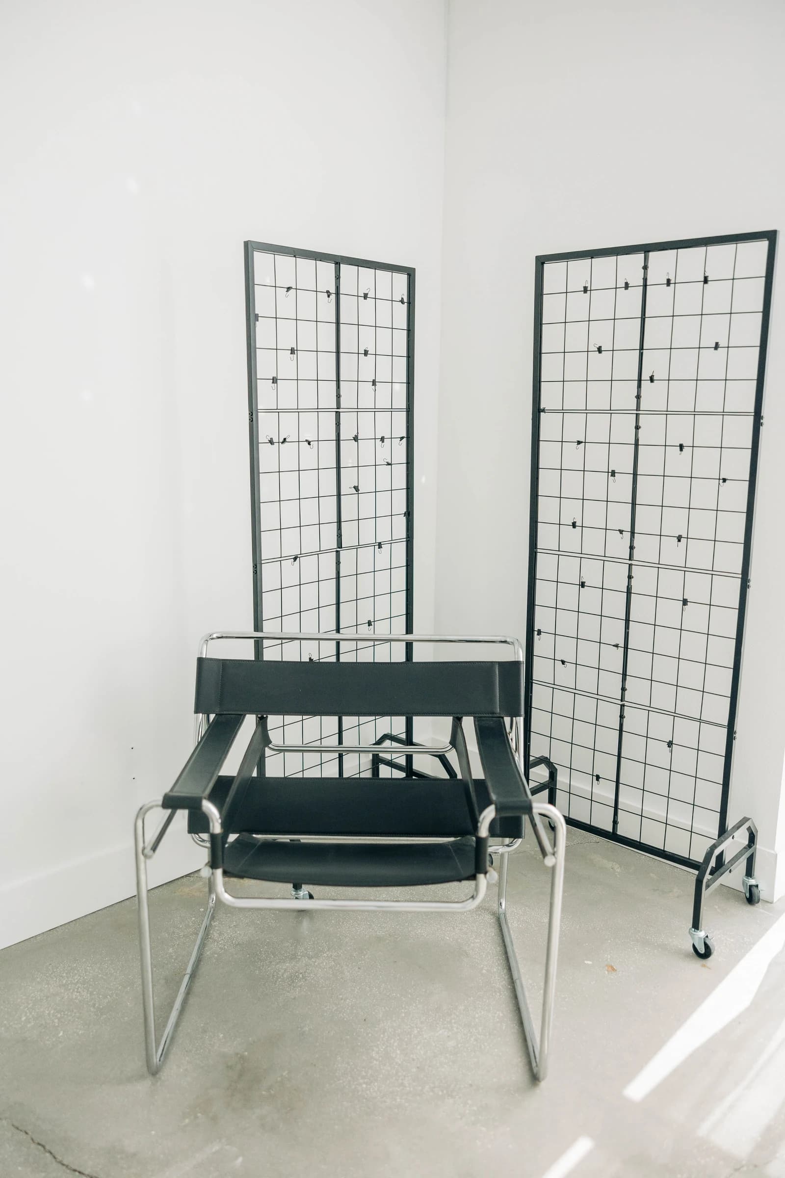 The black leather lounge chair in Studio B